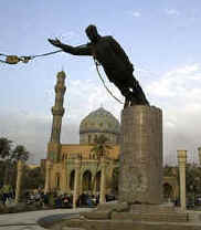 Saddam statue about to fall.